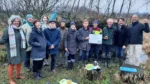 20231216_vrijwilligersgroep-met-juryleden-Gemma-Tiedink-l-en-Arjan-Vriend-r-directeur-bestuurder-SLG_LR